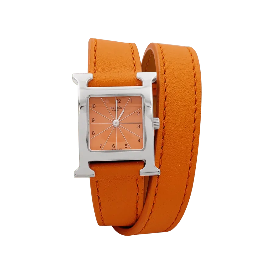 Hermès Femme , "Heure H", acier, cadran orange.