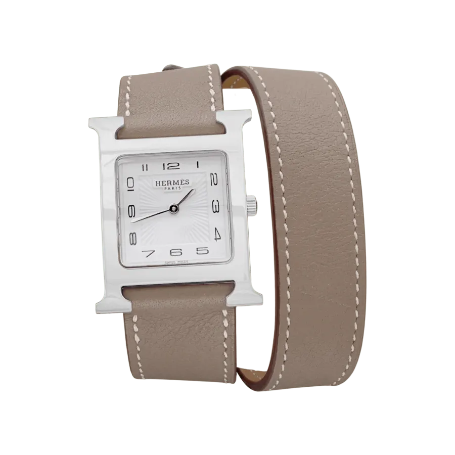 Hermès "Heure H", acier sur cuir.