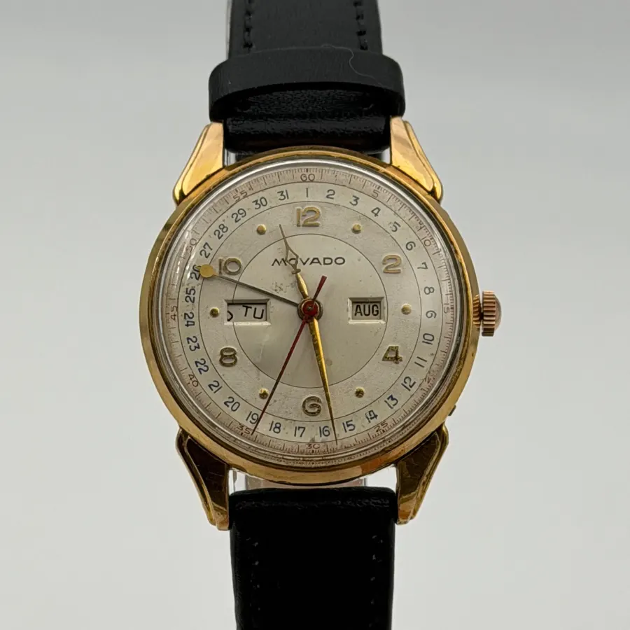 Movado Vintage Triple Calendar in gold and steel